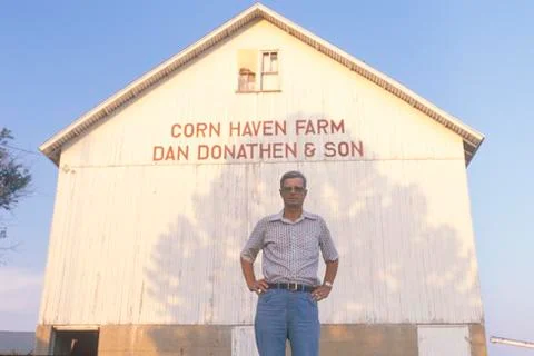 Farmer standing in front of corn barn in South Bend, IN Stock Photos