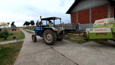 The farmer starts working in the field Stock Footage 142856060