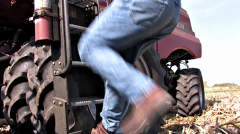Farmer Stepping into Combine Video stock 31149249