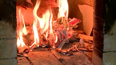 The farmer stirs up Russian oven for baking bread Stock Footage 85778849