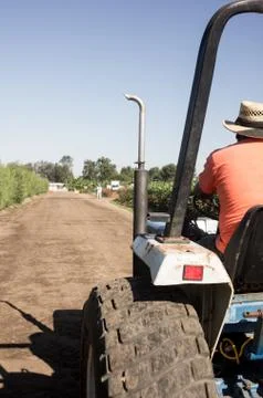 Farmer on tractor Stock Photos