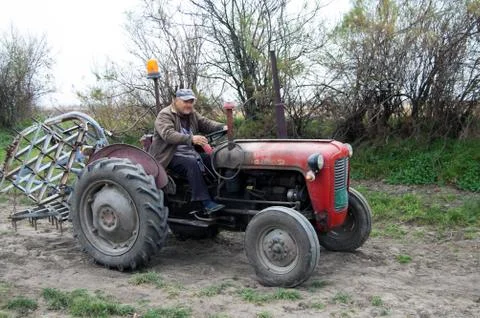 Farmer on a tractor Stock Photos