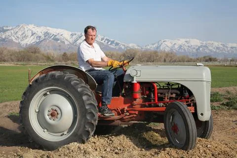 Farmer on tractor Stock Photos