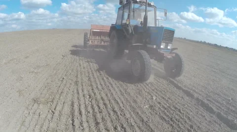 Farmer in tractor preparing land 스톡 동영상 42122423