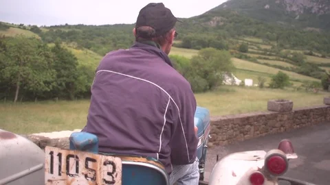 Farmer on tractor with subjective point of view Stock Footage 71722240
