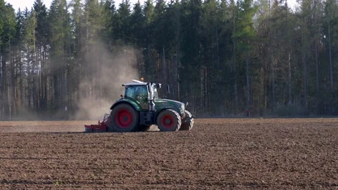 Farmer with tractor working in the fields, Bavaria, Germany Video stock 154236634