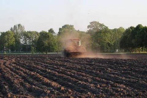 Farmer with tractor working Foto stock
