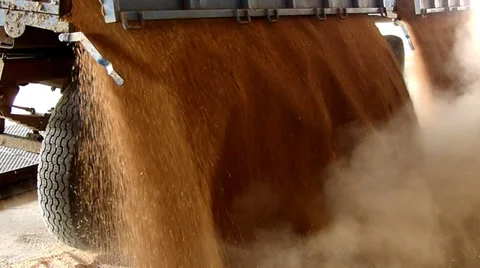 Farmer unloading wheat in a silo, slow motion Stock Footage 35802157