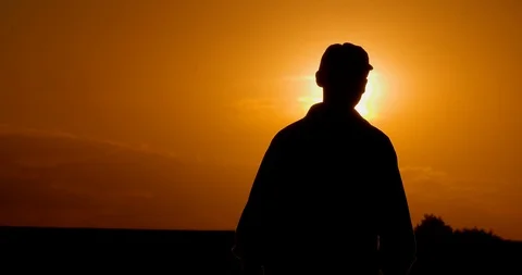 Farmer using digital tablet at farm against sunset Stock Footage 107657826