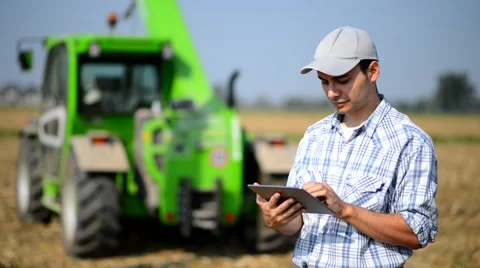 Farmer using his tablet Stock Footage 68092391
