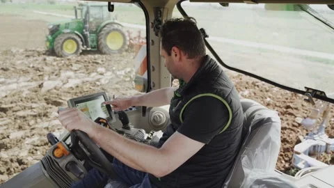 A farmer using precision agriculture and other Stock Footage 244085538