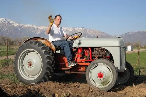 Farmer waving Stock Photos