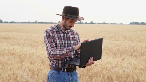 Farmer in wheat field Stock Footage 110817570