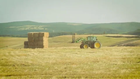 Farmer at work in the fields with the tractor Stock Footage 69212175