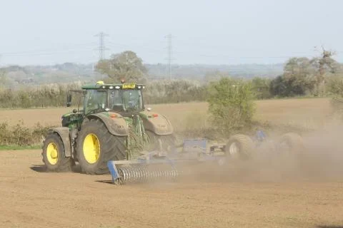 Farmer working in a drought in UK Stock Photos