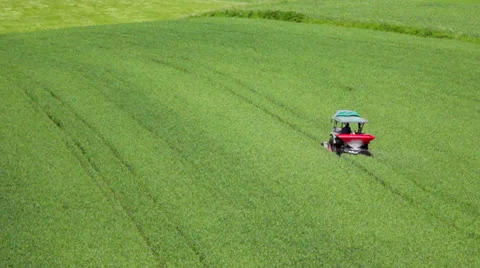 Farmer working in the field Stock Footage 24704295