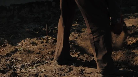 Farmer working in garden, cleaning the vegetable patch Stock Footage 128432058