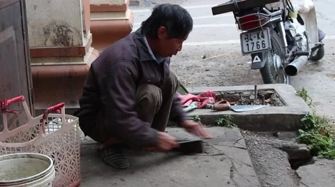 Farmer working knife sharpener Stock Footage 46457389