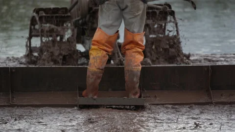 Farmer working with a walking tractor for rice plantation on season Stock Footage 158491216