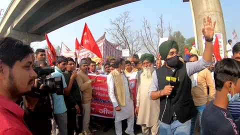 Farmers are protesting against the new farm laws in India Stock Footage 144634904