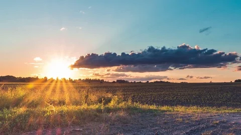 Farmers Field Sunset Rays Clouds Blue Sky Dawn Stock-Footage 79184465