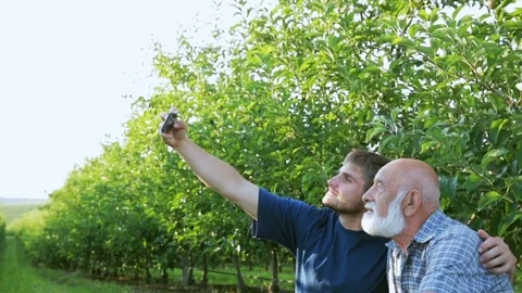 Farmers make a photo together Stock Footage