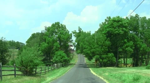 Farmhouse road Stock Footage 8601782