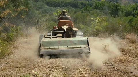 Farming agricultural tractor work on preparing ground for plantation,agriculture Stock Footage 137059065