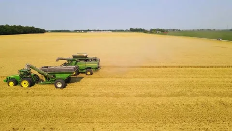 Farming Combine Harvest Tracking Left Aerial Stock Footage