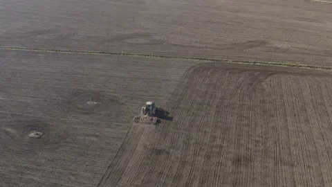 Farming in Finland. Tractor harrowing. Stock Footage 154036972