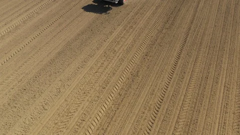 Farming maize sowing in spring agriculture in Europe aerial video 4K Stock Footage 106883362