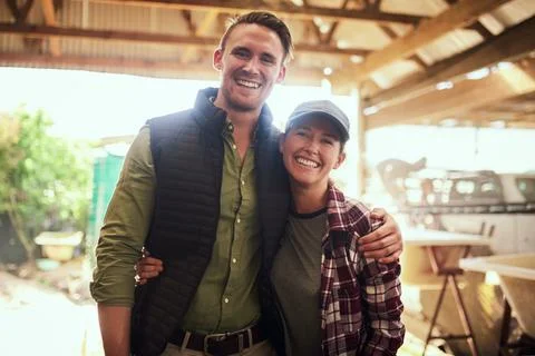 Farming is second nature to us. Portrait of a happy young couple posing together Stock Photos