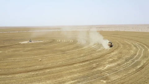 Farming techniques showcased through crop rotation in expansive fields under Stock Footage 302622035