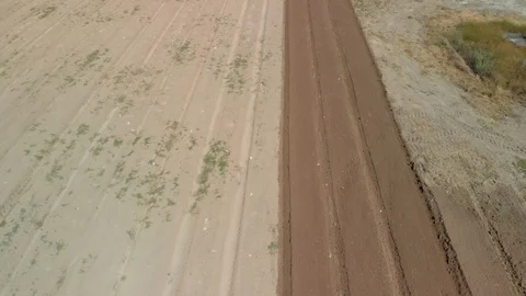 Farming tractor plowing on field. Video stock 127550533