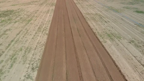 Farming tractor plowing on field. Video stock 127550602