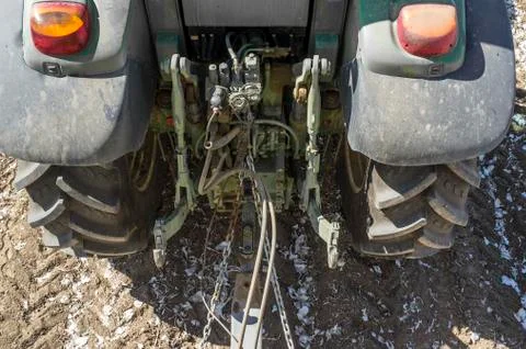 Farming tractor pulling a trailer. Atatching area detail Stock Photos