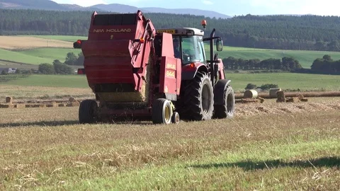 Farming Tractor Round Baling Medium Wide 4K 動画素材 81206515