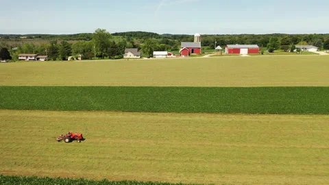 Farms, agricultural fields, tractor working in field Video stock 156635636