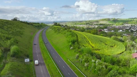 Farms and Fields over Kingskerswell and Road A380 from a drone, Devon, England Stock Footage 274765953
