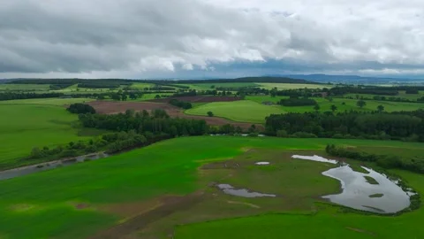 Farms and Fields over River Eden and River Eamont from a drone, Cumbria, England Stock Footage 277858577