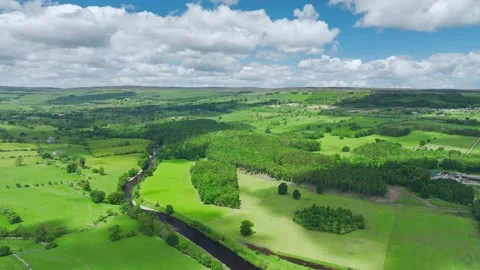 Farms and Fields over River Ure from a drone, North Yorkshire, England Stock Footage 278628016