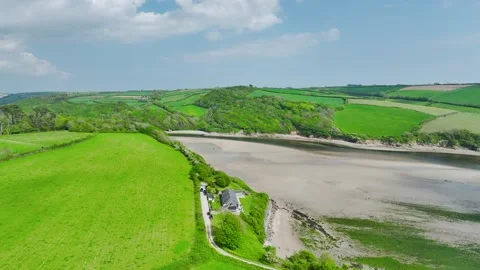 Farms and fields over River Emme, Mothecombe, South Devon, England, Europe Stock-Footage 312479025