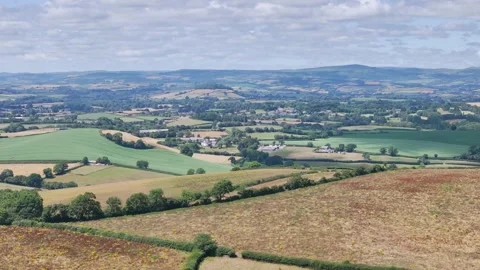 Farms and Fields over Torquay from a drone, Devon, England Vidéo 312825056