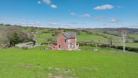 Farms over Corry Brook from a drone, Axminster, Devon, England Stock Footage 304633289