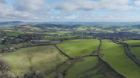 Farms over Road A35, Morcombelake Village, Bridport, Dorset, England Stock Footage 304819719