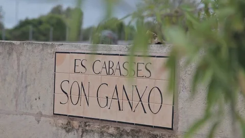 Farms in the suburbs of Cala Mendia Board with the name of the farm. Stock Footage 75740317