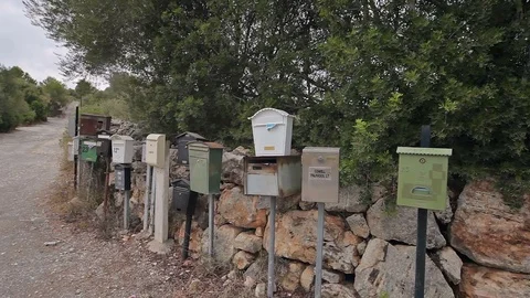 Farms in the suburbs of Cala Mendia Mailboxes near the highway. Stock Footage 75737937
