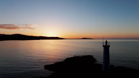 Faro baliza do Lago And Calm Sea At Dusk in A Coruña, Spain. - aerial shot Vídeos de archivo 296972448