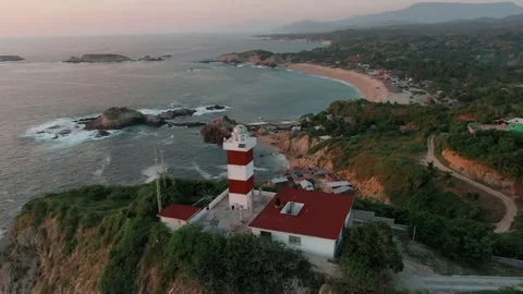 Faro De Bucerias Lighthouse In The Michoacan, Mexico. - aerial pullback shot Vídeos de archivo 337043108