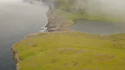 Faroe Islands - Bøsdalafossur waterfall flowing from Sørvágsvatn on Vágar Stock Footage